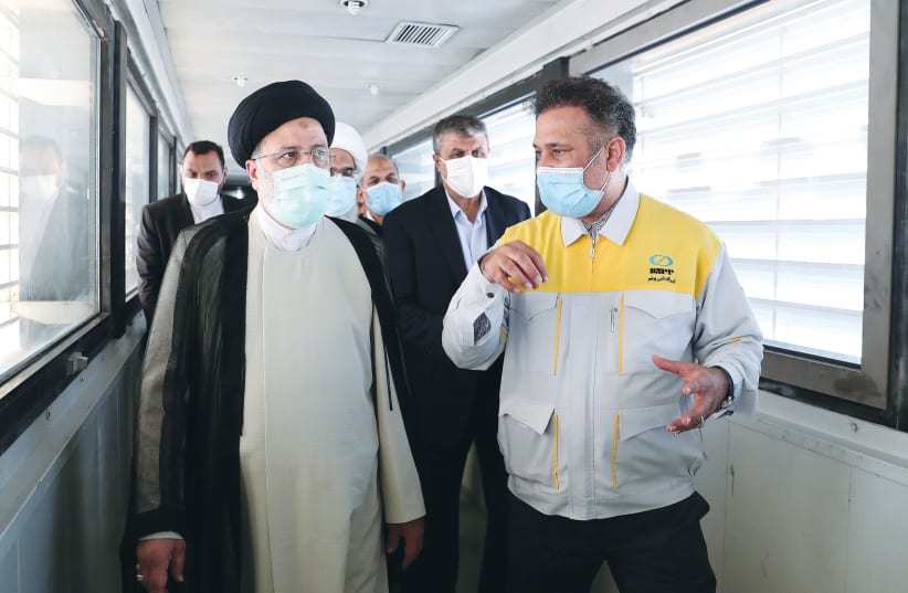  IRANIAN PRESIDENT Ebrahim Raisi visits the Bushehr nuclear power plant earlier this month. (photo credit: OFFICIAL PRESIDENTIAL WEBSITE / REUTERS)