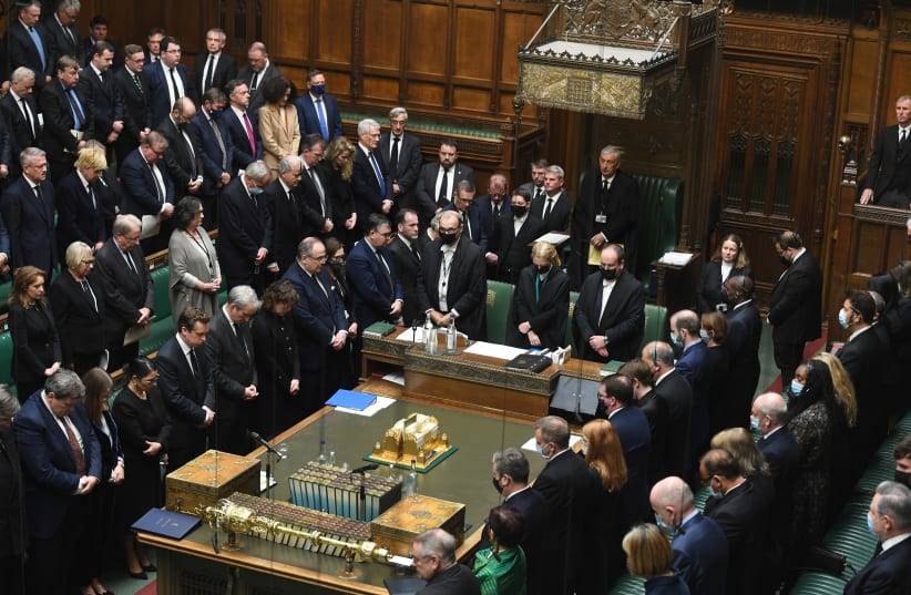  Members of Parliament pay tribute to murdered MP David Amess with a minute's silence in the House of Commons in London, Britain October 18, 2021. (photo credit: VIA REUTERS)