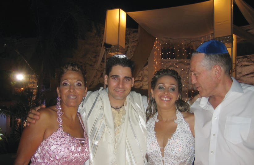  RACHEL Ohana and Avi Rivkind stand on either side of the happy couple at Shimon and Avia’s wedding. (photo credit: Courtesy Ohana family)