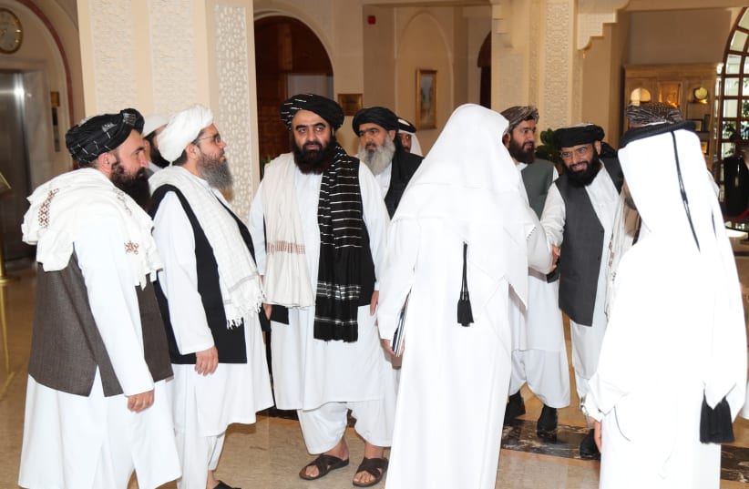 Taliban delegates arrive to meet with US and European delegates in Doha, Qatar, last week. (photo credit: REUTERS)