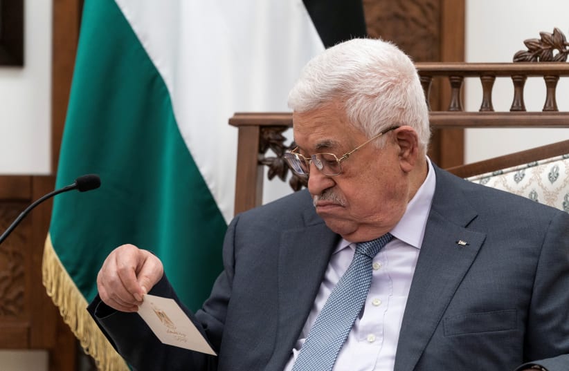  Palestinian President Mahmoud Abbas attends a joint press conference with U.S. Secretary of State Antony Blinken (not pictured), in the West Bank city of Ramallah, May 25, 2021. (photo credit: ALEX BRANDON/POOL VIA REUTERS)