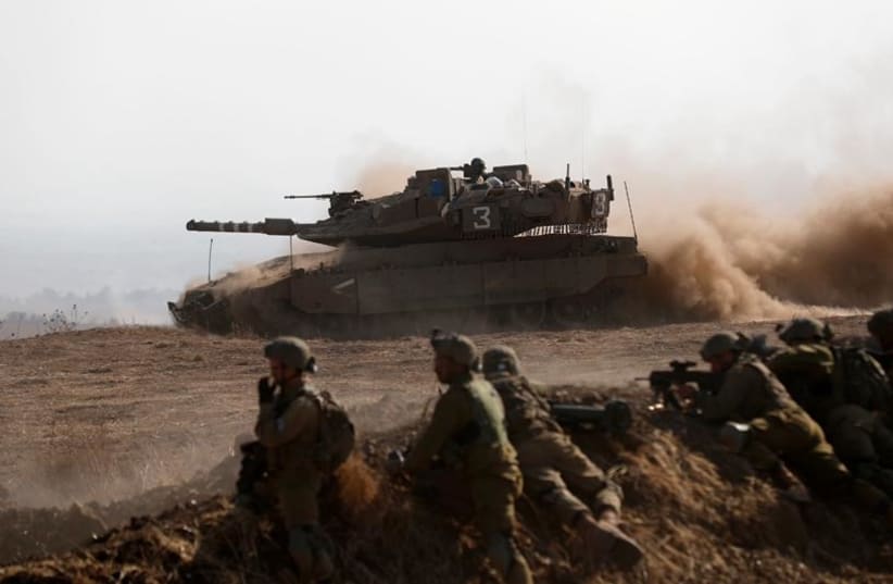 IDF soldiers are seen taking part in military drills in Israel's North to simulate a war with Hezbollah. (photo credit: IDF SPOKESPERSON'S UNIT)
