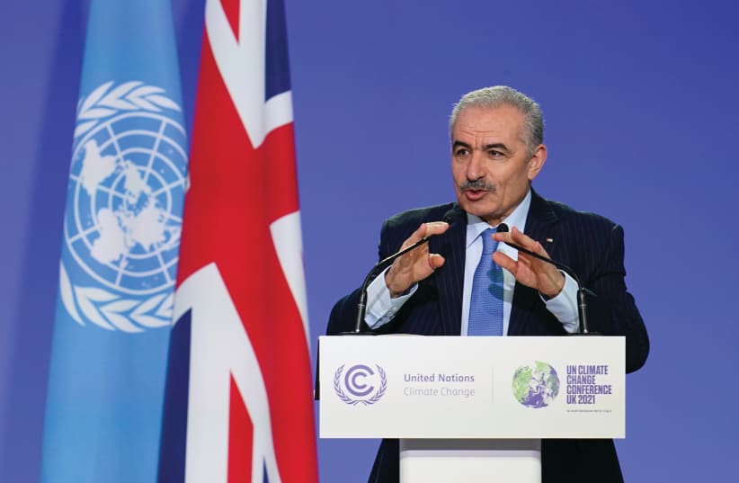  PALESTINIAN PRIME Minister Mohammad Shtayyeh addresses the UN Climate Change Conference in Glasgow on Monday. (photo credit: Ian Forsyth/Reuters)