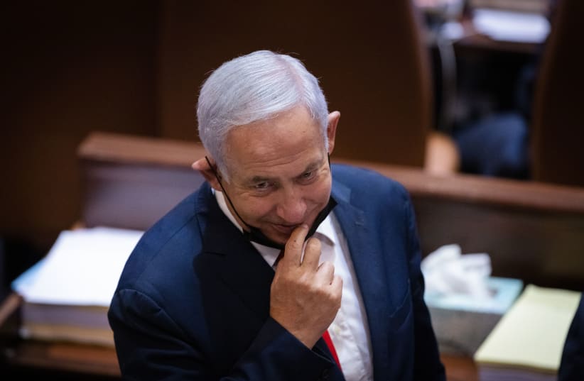  Benjamin Netanyahu attends a plenum session and a vote on the state budget at the assembly hall of the Israeli parliament, in Jerusalem on November 3, 2021 (photo credit: OLIVIER FITOUSSI/FLASH90)