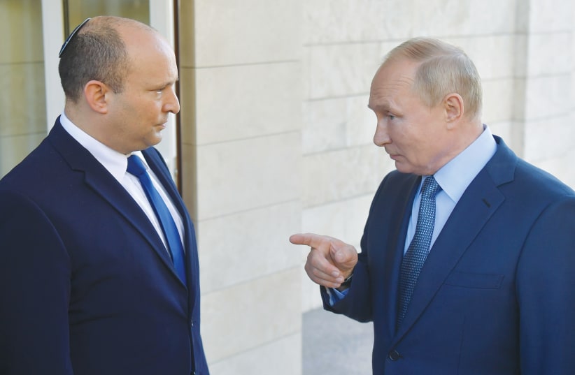 RUSSIAN PRESIDENT Vladimir Putin meets with Prime Minister Naftali Bennett in Sochi last month. (photo credit: Evgeny Biyatov/Sputnik-Kremlin via Reuters)