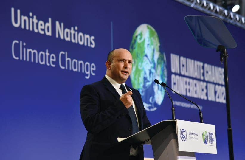 PRIME MINISTER Naftali Bennett addresses the UN Climate Conference in Glasgow on Monday. (photo credit: Natan Zach/GPO)