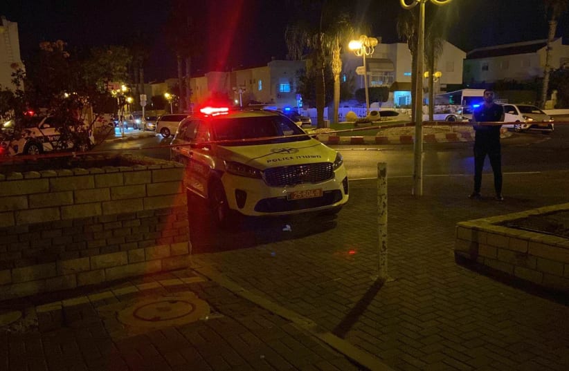  A police car is seen at the scene of the crime in Nahariya (photo credit: ISRAEL POLICE)