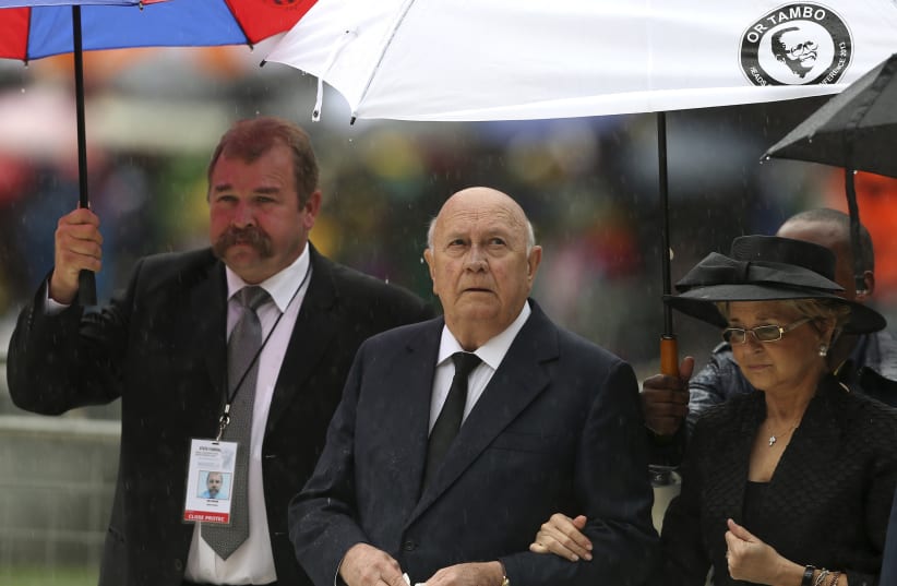  Former South African president De Klerk and his wife Elita arrive to attend the national memorial service for Nelson Mandela in Johannesburg (photo credit: REUTERS/SIPHIWE SIBEKO)