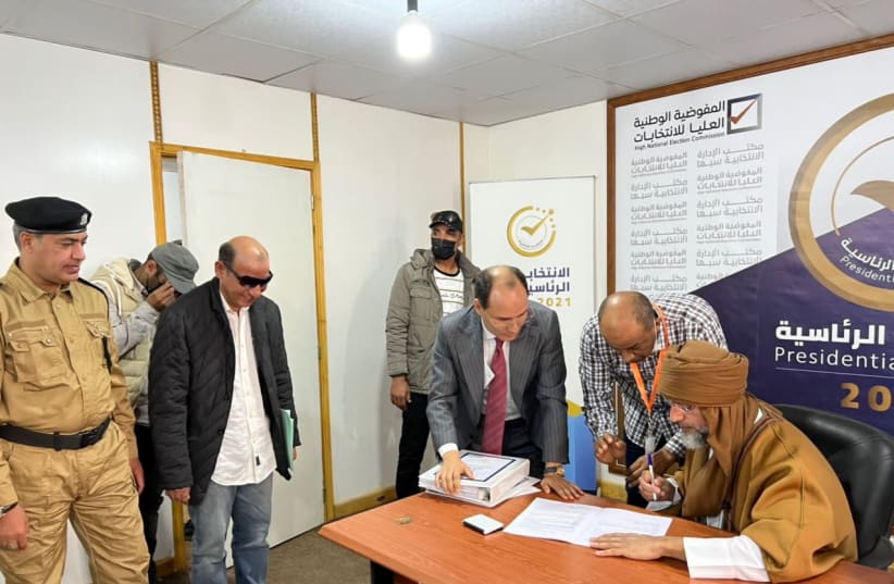 Saif al-Islam al-Gaddafi, son of Libya's former leader Muammar al-Gaddafi, registers as a presidential candidate for the December 24 election, at the registration centre in the southern town of Sebha, Libya November 14, 2020.  (photo credit: KHALED AL-ZAIDY/HANDOUT VIA REUTERS)