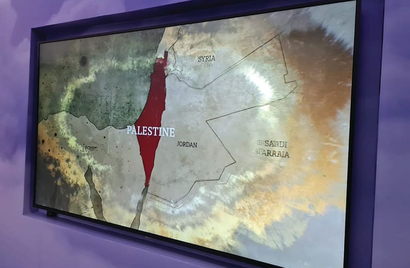  A MAP in the Palestinian pavilion showing Palestine as including the State of Israel. (photo credit: EMILY SCHRADER)