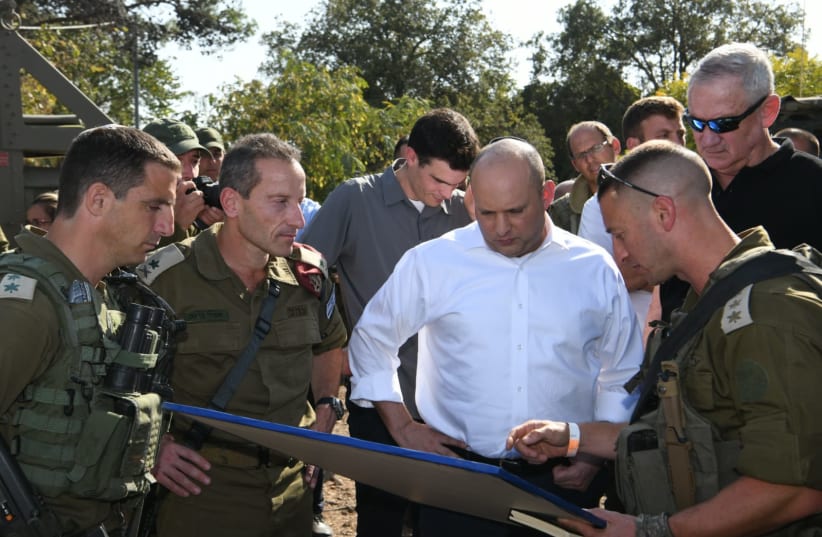  Prime Minister Naftali Bennett and Defense Minister Benny Gantz visit an IDF drill in northern Israel (photo credit: AMOS BEN GERSHOM/GPO)