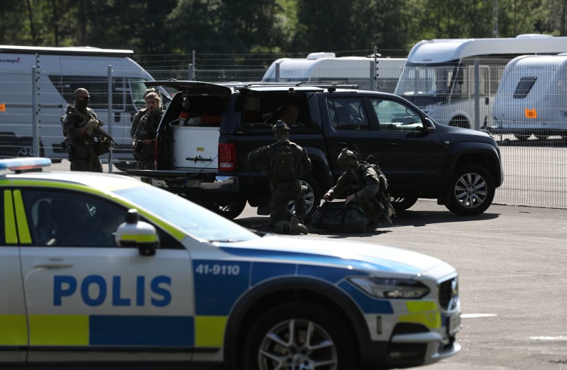  A police vehicle is seen at Hallby Prison, outside Eskilstuna, Sweden July 21, 2021 (photo credit: Per Karlsson/TT News Agency/via REUTERS)