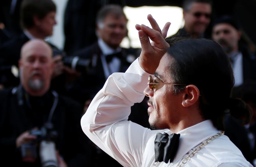  Nusret Gokce, known as Salt Bae, poses at the 72nd Cannes Film Festival (photo credit: REUTERS/STEPHANE MAHE)