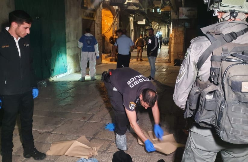  Police collect evidence at the site of a stabbing in Jerusalem Old City on November 17, 2021. (photo credit: ISRAEL POLICE SPOKESPERSON'S UNIT)