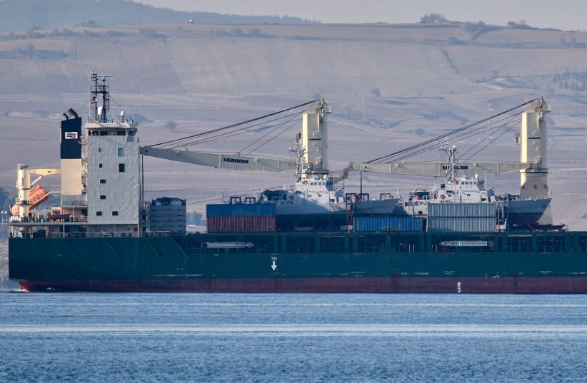  US flagged general cargo ship Ocean Grand, carrying two US Coast Guard cutters, sails in the Dardanelles, on its way to the Black Sea, in Canakkale,Turkey November 20, 2021. (photo credit: REUTERS/YORUK ISIK)