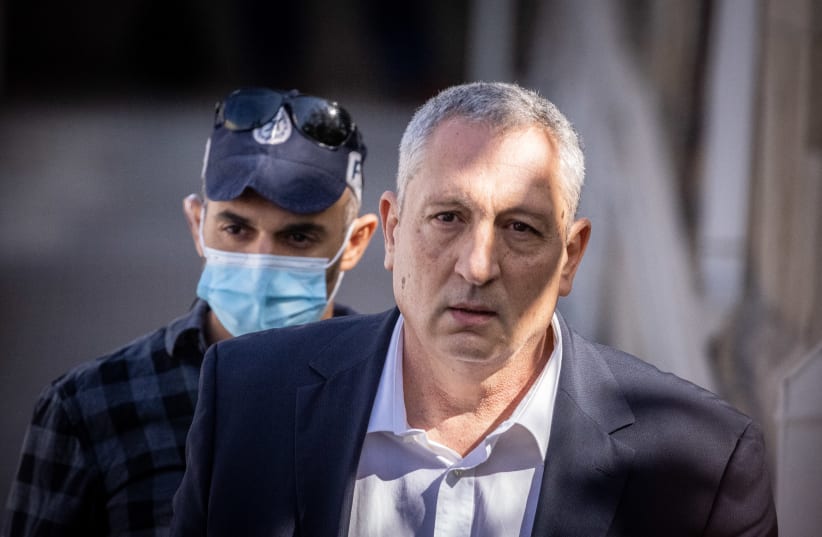  Nir Hefetz seen leaving the trial of former Israeli Prime Minister Benjamin Netanyahu, outside the District Court in Jerusalem, November 16, 2021.  (photo credit: YONATAN SINDEL/FLASH90)