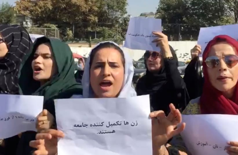  Women protest outside the Arg Presidential Office in Kabul, Afghanistan. (photo credit: AAMAJ NEWS AGENCY/via REUTERS)