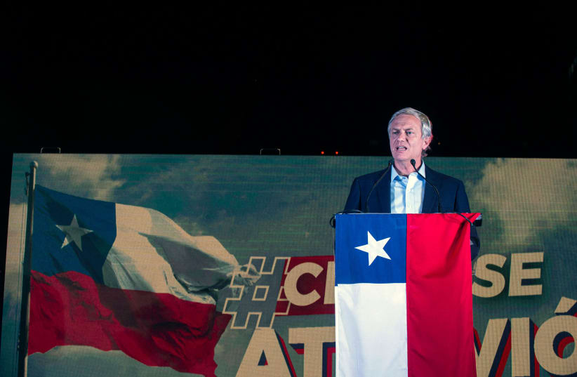  Chilean presidential candidate José Antonio Kast addresses supporters in Santiago, Nov. 21, 2021, following the first round of general election results.  (photo credit: Ernesto Benavides/AFP via Getty Images)