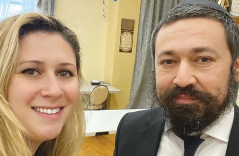  THE WRITER and Rabbi Shlomo Noginski attend last week’s event: ‘If every antisemitic attack resulted in deafening messages of Jewish pride and courage, people would think twice before starting with us,’ the rabbi told the gathering. (photo credit: Courtesy)