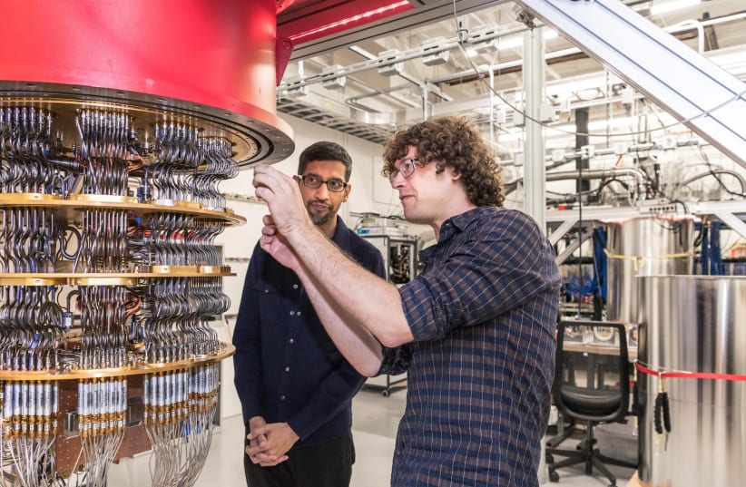  A handout picture from October 2019 shows Sundar Pichai and Daniel Sank (R) with one of Google's Quantum Computers in the Santa Barbara lab, California, US (photo credit: GOOGLE/HANDOUT VIA REUTERS)