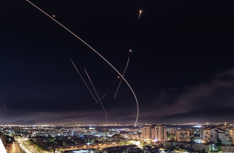  Iron Dome missile defense interceptors are shot over the Israeli city of Ashkelon during Israel's conflict with Hamas in May 2021. (photo credit: Avi Roccah/Flash90/JTA)