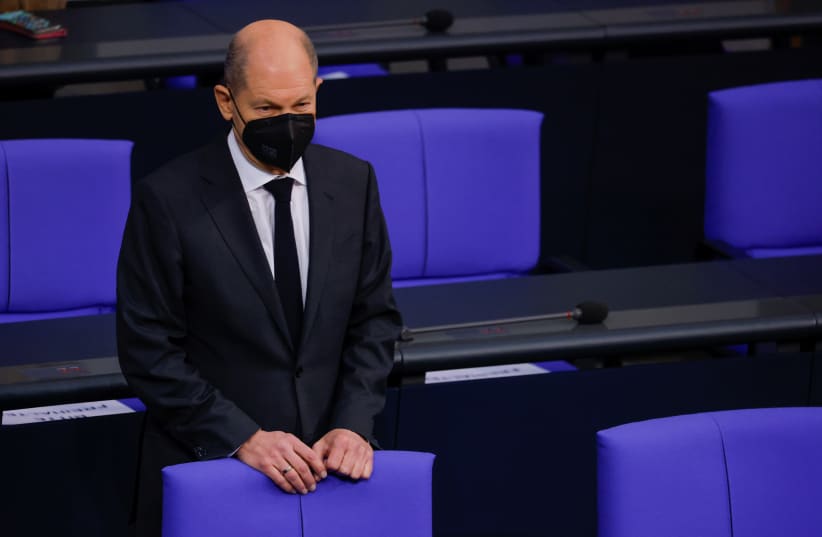  Designated German Chancellor Olaf Scholz attends a session of the Bundestag, the German lower house of Parliament, in Berlin. (photo credit: REUTERS)