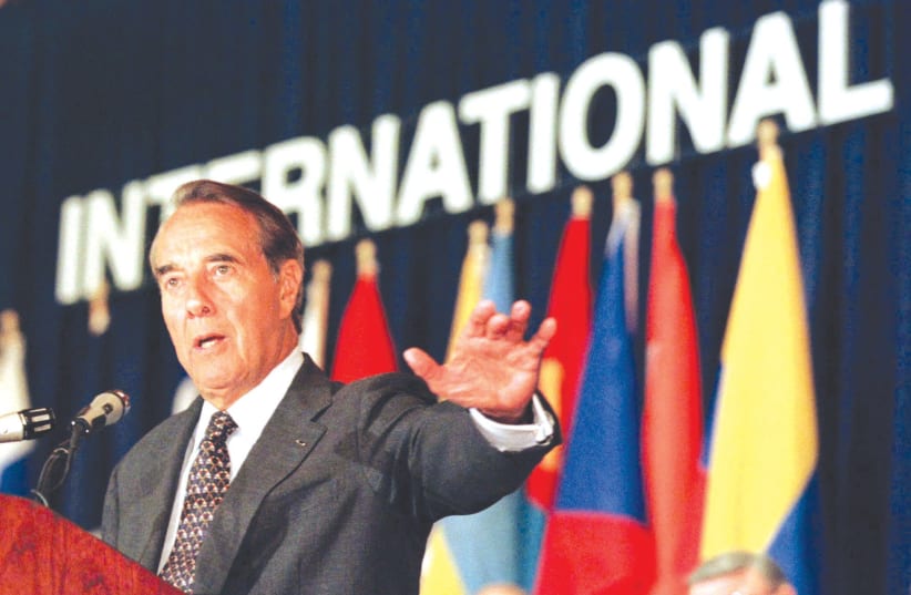  THEN-US PRESIDENTIAL nominee Bob Dole addresses the B’nai B’rith International Convention in Washington in September 1996, pledging a stronger and closer relationship with the Netanyahu government.  (photo credit: REUTERS)