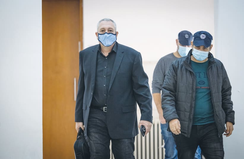  NIR HEFETZ arrives at the Jerusalem District Court this week. (photo credit: YONATAN SINDEL/FLASH90)