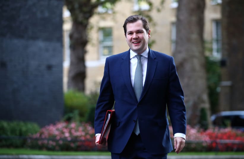  Britain's Secretary of State for Housing, Communities and Local Government Robert Jenrick walks outside Downing Street in London, Britain, September 30, 2020 (photo credit: REUTERS/HANNAH MCKAY)