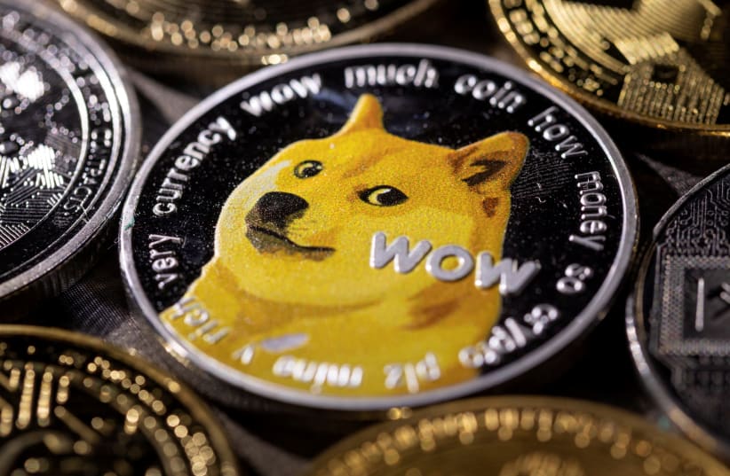 A representation of the cryptocurrency Dogecoin is seen in this illustration taken November 29, 2021. (photo credit: REUTERS/DADO RUVIC/ILLUSTRATION/FILE PHOTO)