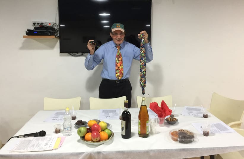  Dr. Richard H. Schwartz prepares for his annual Tu Bishvat seder. (photo credit: RICHARD SCHWARTZ)