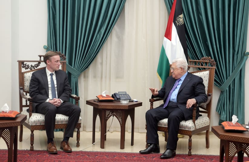  Palestinian President Mahmoud Abbas meets with U.S. National Security Advisor Jake Sullivan in Ramallah, in the West Bank, December 22, 2021. (photo credit: PALESTINIAN PRESIDENT OFFICE (PPO)/HANDOUT VIA REUTERS)