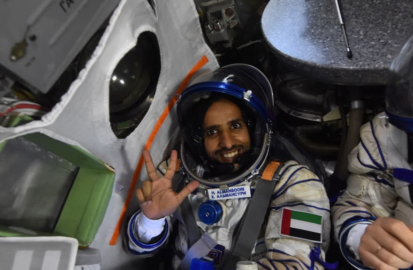  Emirati astronaut Hazzaa Al Mansoori gestures as he gets ready at the International Space Station (ISS) in Star city in Moscow, Russia (photo credit: VIA REUTERS)