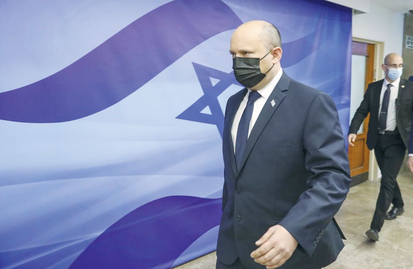  PRIME MINISTER Naftali Bennett on his way to a cabinet meeting.  (photo credit: MARC ISRAEL SELLEM/THE JERUSALEM POST)