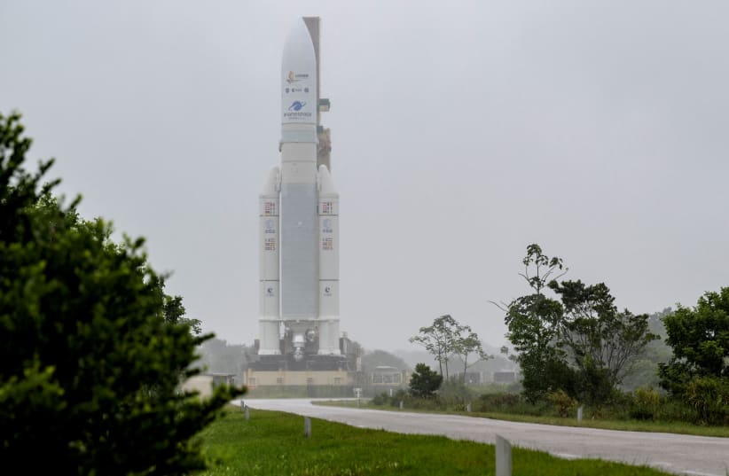  Arianespace's Ariane 5 rocket, with NASA's James Webb Space Telescope onboard, is rolled out to the launch pad at Europe’s Spaceport, the Guiana Space Center in Kourou, French Guiana December 23, 2021 (photo credit: VIA REUTERS)