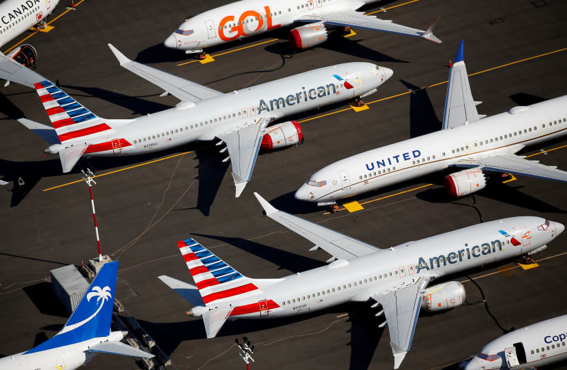  Grounded Boeing 737 MAX aircraft are seen parked in an aerial photo at Boeing Field in Seattle, Washington, U.S. July 1, 2019. (photo credit: REUTERS/LINDSEY WASSON)