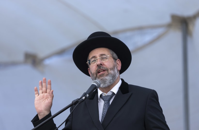  Israel's Ashkenazi Chief Rabbi David Lau attends a ceremony of the Israeli police for the Jewish new year at the National Headquarters of the Israel Police in Jerusalem on September 5, 2021.  (photo credit: OLIVIER FITOUSSI/FLASH90)