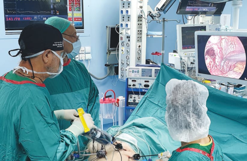  A surgery using one of Human Xtensions' products. (photo credit: Human Xtension)