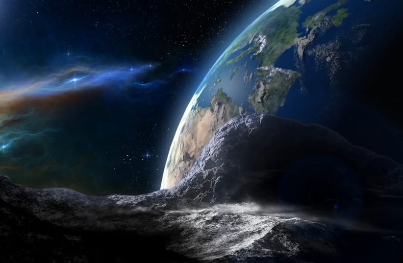 An asteroid is seen heading towards the planet in this artistic rendition. (photo credit: PIXABAY)