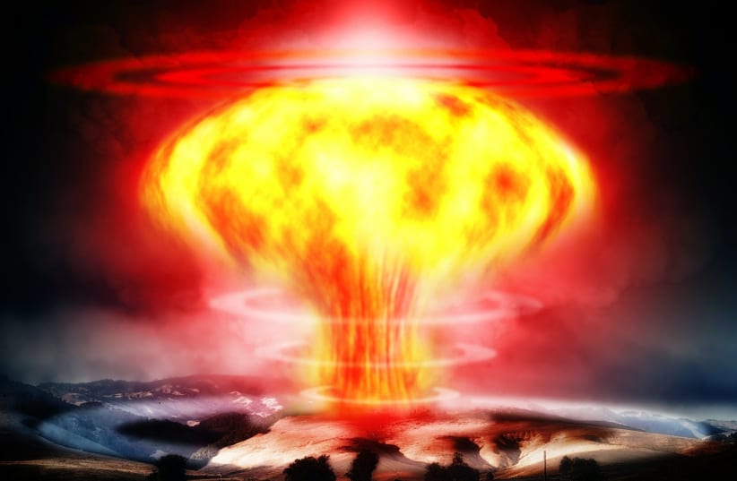  A mushroom cloud is seen caused by a nuclear bomb in this illustration. (photo credit: PIXABAY)