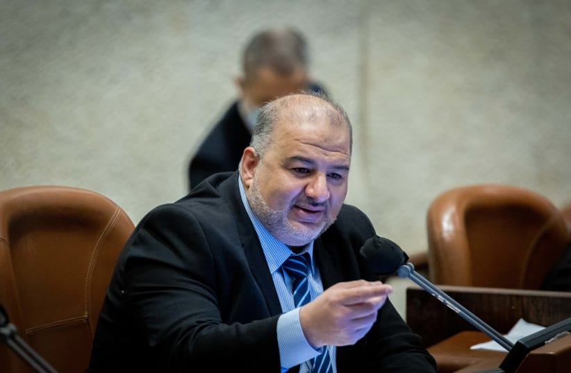 MK Mansour Abbas during a discussion on the Electricity Law connecting to Arab and Bedouin towns, during a plenum session in the assembly hall of the Israeli parliament in Jerusalem, January 5, 2022.  (photo credit: YONATAN SINDEL/FLASH 90)