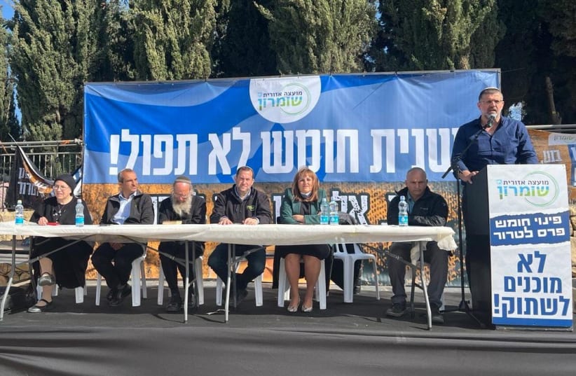  Avichai Boaron is seen speaking alongside a group of prominent settler leaders at a protest outside the Prime Minister's Office, on January 9, 2022. (photo credit: SAMARIA REGIONAL COUNCIL)