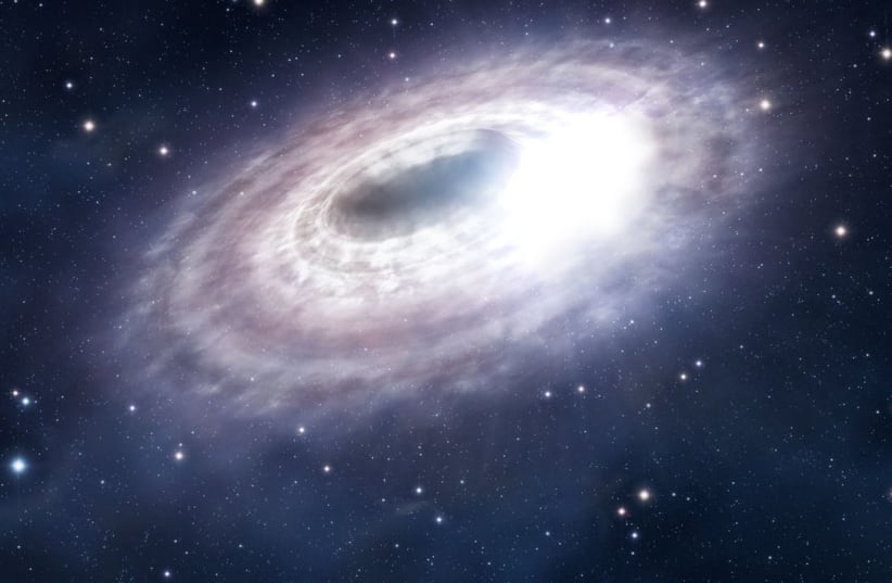  Artistic impression of a material disc with illuminated gas around Sagittarius A*, the supermassive black hole in the center of the Milky Way. (photo credit: Wikimedia Commons)