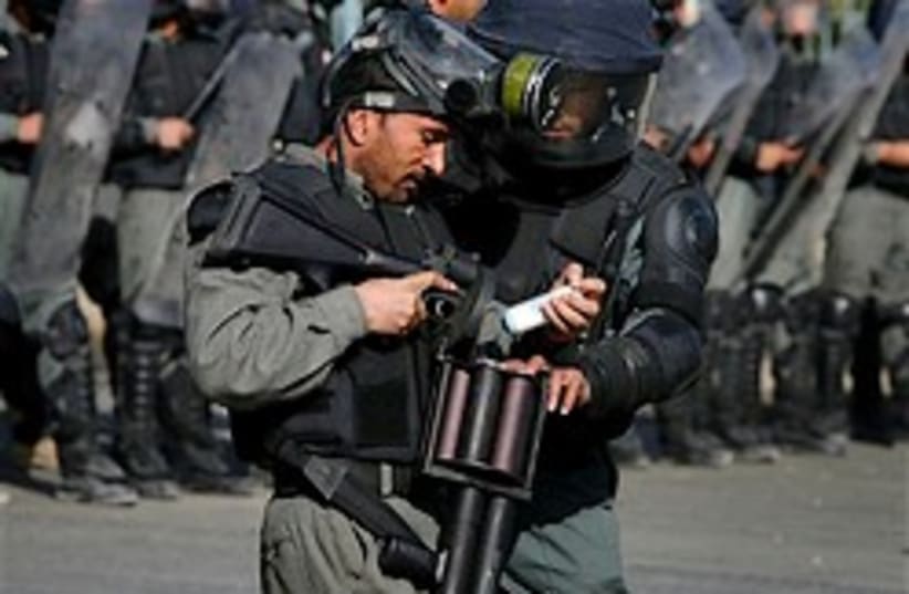 Afghan riot policeman cool 248.88 (photo credit: )