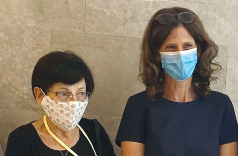  THE WRITER (right), on the day of her inaugural speech to the Knesset, August 5, 2020, poses with former Supreme Court president Miriam Naor. (photo credit: Rafi Wunsh)