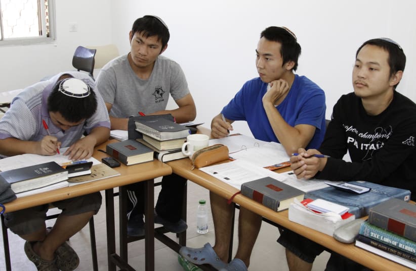  YOUNG CHINESE men study Torah in Yeshivat Hamivtar in Gush Etzion, preparing for their Orthodox conversion. (photo credit: GERSHON ELINSON/FLASH90)