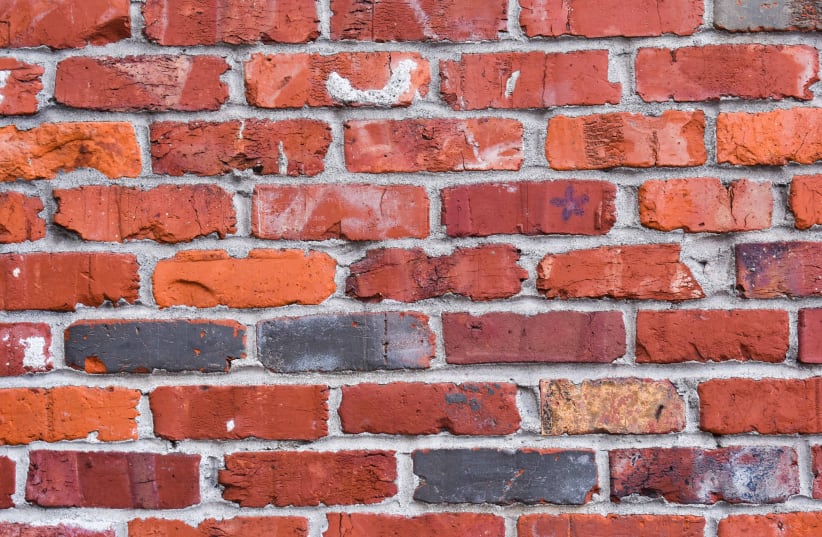  EXPOSING RED brick walls exposes the writers’ and directors’ complete detachment from reality. (photo credit: UNSPLASH)