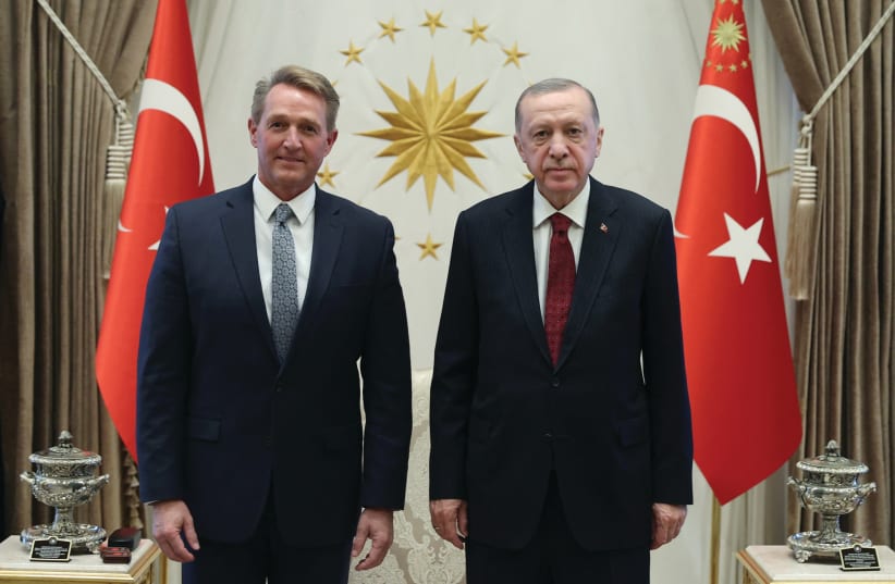  TURKISH PRESIDENT Recep Tayyip Erdogan meets with new US Ambassador to Turkey Jeff Flake at the Presidential Palace in Ankara last week.  (photo credit: PRESIDENTIAL PRESS OFFICE/HANDOUT VIA REUTERS)