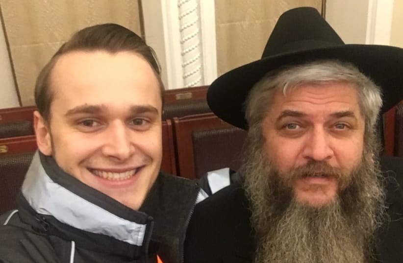  SHIMINOV’S BROTHER Oleksey Yisroel Poterlevych in Ukraine with one of the country’s chief rabbis,Moshe Reuven Azman.  (photo credit: AVITAL SHIMINOV)