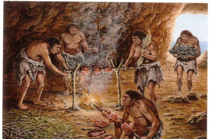  Reconstruction of meat roasting on campfire at the Lazaret Cave, France. (photo credit: M. A. DE LUMLEY)